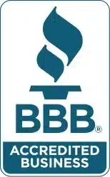 The image shows the Better Business Bureau (BBB) Accredited Business logo, which features the stylized blue torch symbol of the BBB above the large blue letters "BBB." Below this is a blue rectangle with white text stating "ACCREDITED BUSINESS," often seen on local company advertisements for services like driveway paving.